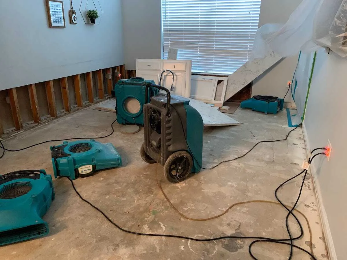 Dehumidifier in flood-cut room for Water Damage Restoration in Raynham